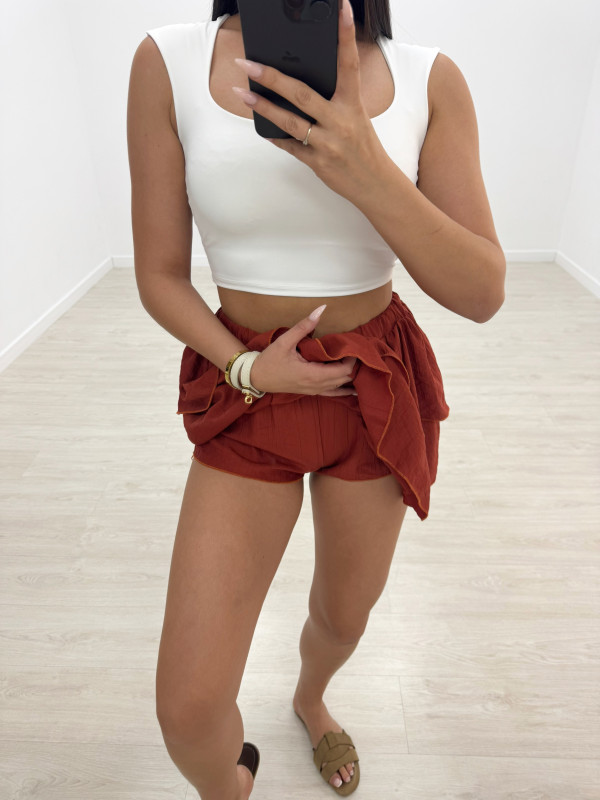 FALDA MINI VOLANTE (CON SHORT) - CALDERA